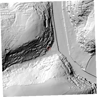 Shaded relief map of the ground around PL132EN, computed from Environment Agency LiDAR. The ground here sits at about 9 m above sea level and falls 104 m across the surrounding 800 m. Surface water reaching this point runs off ground lying to the north-west, 42.7 m higher.