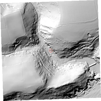 Shaded relief map of the ground around PL132RG, computed from Environment Agency LiDAR. The ground here sits at about 9 m above sea level and falls 132 m across the surrounding 800 m. Surface water reaching this point runs off ground lying to the south-west, 123.9 m higher.