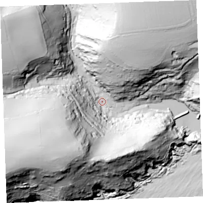 Shaded relief map of the ground around PL132RP, computed from Environment Agency LiDAR. The ground here sits at about 5 m above sea level and falls 132 m across the surrounding 800 m. Surface water reaching this point runs off ground lying to the west-south-west, 124.6 m higher.