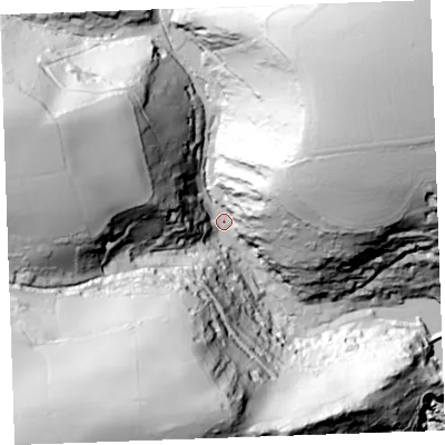 Shaded relief map of the ground around PL132RQ, computed from Environment Agency LiDAR. The ground here sits at about 11 m above sea level and falls 134 m across the surrounding 800 m. Surface water reaching this point runs off ground lying to the north-east, 107.1 m higher.