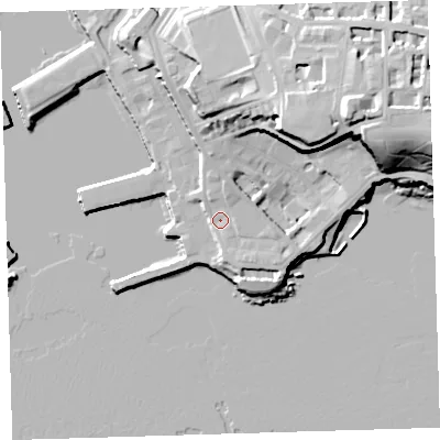 Shaded relief map of the ground around PL13DA, computed from Environment Agency LiDAR. The ground here sits at about 7 m above sea level and falls 35 m across the surrounding 800 m. Surface water reaching this point runs off ground lying to the north-north-west, 5.1 m higher.