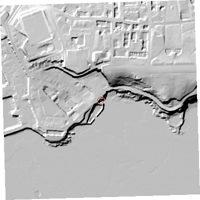 Shaded relief map of the ground around PL13DE, computed from Environment Agency LiDAR. The ground here sits at about 7 m above sea level and falls 36 m across the surrounding 800 m. Surface water reaching this point runs off ground lying to the east-north-east, 35.4 m higher.