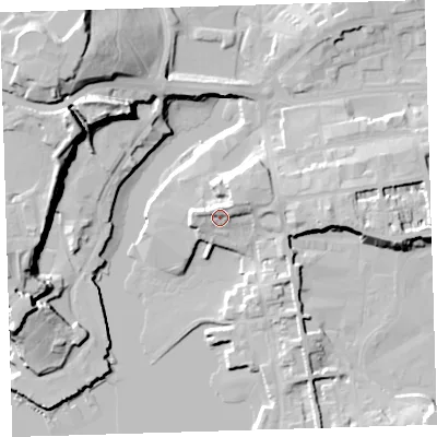 Shaded relief map of the ground around PL13QZ, computed from Environment Agency LiDAR. The ground here sits at about 9 m above sea level and falls 32 m across the surrounding 800 m. Surface water reaching this point runs off ground lying to the north-east, 6.0 m higher.
