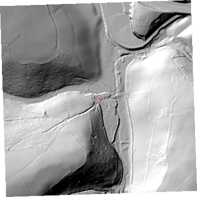 Shaded relief map of the ground around PL143PX, computed from Environment Agency LiDAR. The ground here sits at about 32 m above sea level and falls 90 m across the surrounding 800 m. Surface water reaching this point runs off ground lying to the south-west, 77.2 m higher.