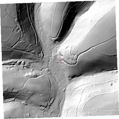 Shaded relief map of the ground around PL144QZ, computed from Environment Agency LiDAR. The ground here sits at about 59 m above sea level and falls 98 m across the surrounding 800 m. Surface water reaching this point runs off ground lying to the east-north-east, 76.6 m higher.