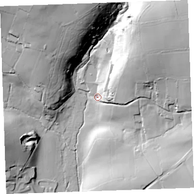 Shaded relief map of the ground around PL145AE, computed from Environment Agency LiDAR. The ground here sits at about 121 m above sea level and falls 65 m across the surrounding 800 m. Surface water reaching this point runs off ground lying to the north-east, 53.4 m higher.