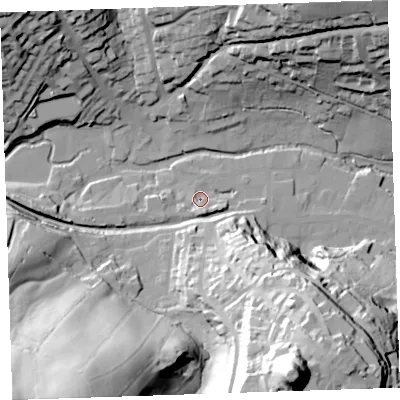 Shaded relief map of the ground around PL158DB, computed from Environment Agency LiDAR. The ground here sits at about 69 m above sea level and falls 91 m across the surrounding 800 m. Surface water reaching this point runs off ground lying to the south-south-east, 7.3 m higher.
