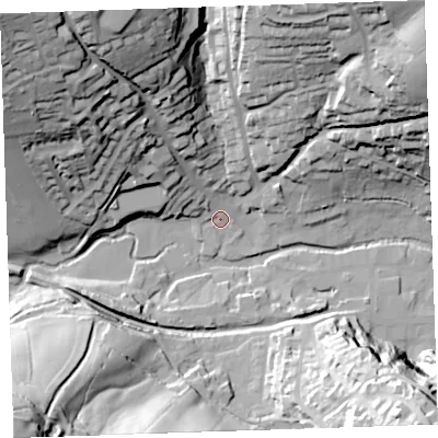 Shaded relief map of the ground around PL158EN, computed from Environment Agency LiDAR. The ground here sits at about 69 m above sea level and falls 64 m across the surrounding 800 m. Surface water reaching this point runs off ground lying to the north-west, 57.6 m higher.