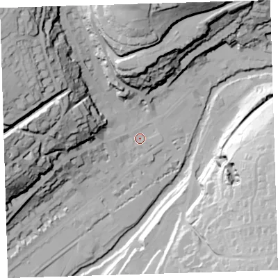 Shaded relief map of the ground around PL198AA, computed from Environment Agency LiDAR. The ground here sits at about 83 m above sea level and falls 68 m across the surrounding 800 m. Surface water reaching this point runs off ground lying to the west-north-west, 2.3 m higher.