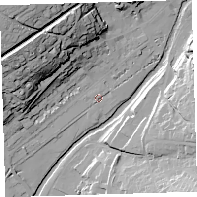 Shaded relief map of the ground around PL198AE, computed from Environment Agency LiDAR. The ground here sits at about 79 m above sea level and falls 71 m across the surrounding 800 m. Surface water reaching this point runs off ground lying to the north, 2.2 m higher.