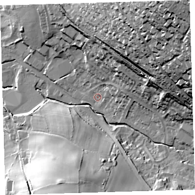 Shaded relief map of the ground around PL199AP, computed from Environment Agency LiDAR. The ground here sits at about 77 m above sea level and falls 74 m across the surrounding 800 m. Surface water reaching this point runs off ground lying to the north-east, 21.0 m higher.