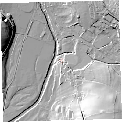 Shaded relief map of the ground around PL199DP, computed from Environment Agency LiDAR. The ground here sits at about 70 m above sea level and falls 45 m across the surrounding 800 m. Surface water reaching this point runs off ground lying to the south-east, 6.9 m higher.