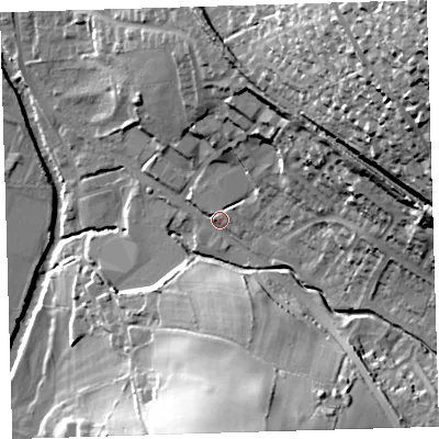 Shaded relief map of the ground around PL199DT, computed from Environment Agency LiDAR. The ground here sits at about 76 m above sea level and falls 72 m across the surrounding 800 m. Surface water reaching this point runs off ground lying to the north-east, 13.4 m higher.
