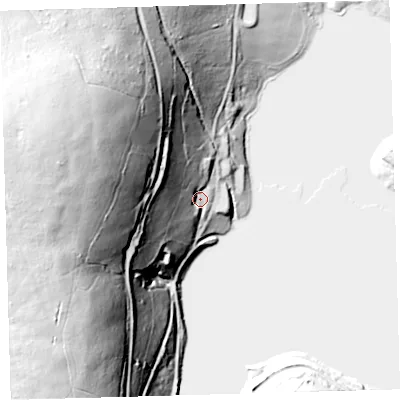 Shaded relief map of the ground around PL206PE, computed from Environment Agency LiDAR. The ground here sits at about 230 m above sea level and falls 83 m across the surrounding 800 m. Surface water reaching this point runs off ground lying to the west-north-west, 69.7 m higher.