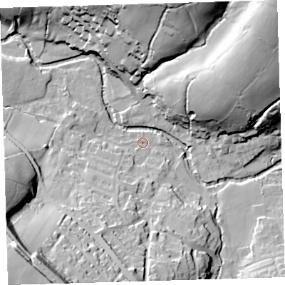 Shaded relief map of the ground around PL207SP, computed from Environment Agency LiDAR. The ground here sits at about 83 m above sea level and falls 62 m across the surrounding 800 m. Surface water reaching this point runs off ground lying to the south, 32.1 m higher.
