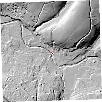 Shaded relief map of the ground around PL207TL, computed from Environment Agency LiDAR. The ground here sits at about 83 m above sea level and falls 61 m across the surrounding 800 m. Surface water reaching this point runs off ground lying to the north-east, 55.9 m higher.