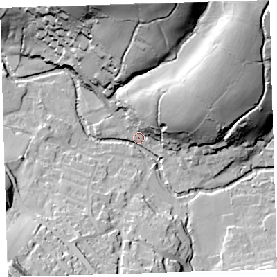 Shaded relief map of the ground around PL207TR, computed from Environment Agency LiDAR. The ground here sits at about 83 m above sea level and falls 63 m across the surrounding 800 m. Surface water reaching this point runs off ground lying to the north-east, 59.4 m higher.