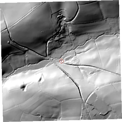 Shaded relief map of the ground around PL210LX, computed from Environment Agency LiDAR. The ground here sits at about 18 m above sea level and falls 65 m across the surrounding 800 m. Surface water reaching this point runs off ground lying to the east-south-east, 62.0 m higher.