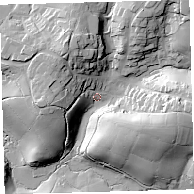 Shaded relief map of the ground around PL210QL, computed from Environment Agency LiDAR. The ground here sits at about 33 m above sea level and falls 51 m across the surrounding 800 m. Surface water reaching this point runs off ground lying to the west, 28.8 m higher.