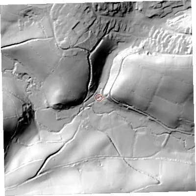 Shaded relief map of the ground around PL210SP, computed from Environment Agency LiDAR. The ground here sits at about 25 m above sea level and falls 85 m across the surrounding 800 m. Surface water reaching this point runs off ground lying to the east-north-east, 43.5 m higher.