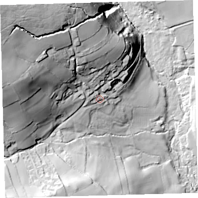 Shaded relief map of the ground around PL219RR, computed from Environment Agency LiDAR. The ground here sits at about 115 m above sea level and falls 111 m across the surrounding 800 m. Surface water reaching this point runs off ground lying to the north-west, 63.5 m higher.