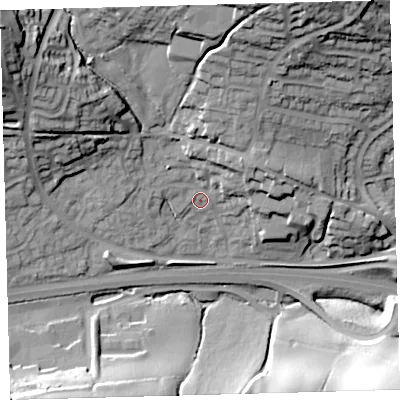Shaded relief map of the ground around PL219TS, computed from Environment Agency LiDAR. The ground here sits at about 53 m above sea level and falls 47 m across the surrounding 800 m. Surface water reaching this point runs off ground lying to the north-west, 32.6 m higher.