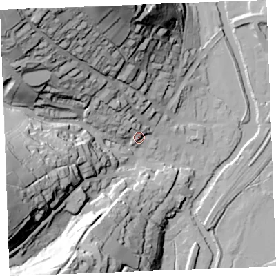 Shaded relief map of the ground around PL220AB, computed from Environment Agency LiDAR. The ground here sits at about 13 m above sea level and falls 88 m across the surrounding 800 m. Surface water reaching this point runs off ground lying to the north-west, 11.5 m higher.