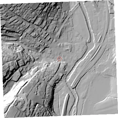 Shaded relief map of the ground around PL220BZ, computed from Environment Agency LiDAR. The ground here sits at about 5 m above sea level and falls 72 m across the surrounding 800 m. Surface water reaching this point runs off ground lying to the south-west, 68.9 m higher.
