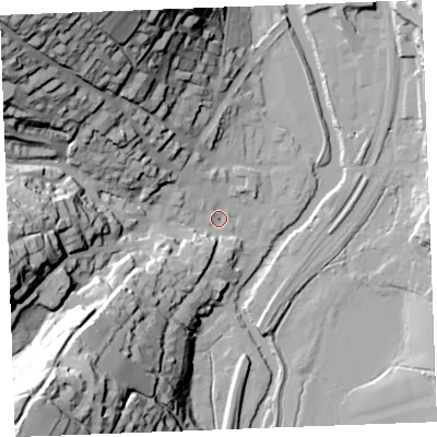 Shaded relief map of the ground around PL220DA, computed from Environment Agency LiDAR. The ground here sits at about 5 m above sea level and falls 73 m across the surrounding 800 m. Surface water reaching this point runs off ground lying to the north-west, 69.9 m higher.