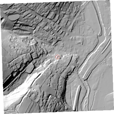 Shaded relief map of the ground around PL220DD, computed from Environment Agency LiDAR. The ground here sits at about 13 m above sea level and falls 90 m across the surrounding 800 m. Surface water reaching this point runs off ground lying to the south-west, 38.1 m higher.