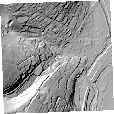 Shaded relief map of the ground around PL220DW, computed from Environment Agency LiDAR. The ground here sits at about 13 m above sea level and falls 96 m across the surrounding 800 m. Surface water reaching this point runs off ground lying to the south-west, 87.5 m higher.