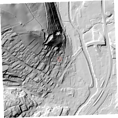 Shaded relief map of the ground around PL220EE, computed from Environment Agency LiDAR. The ground here sits at about 18 m above sea level and falls 118 m across the surrounding 800 m. Surface water reaching this point runs off ground lying to the north-west, 72.9 m higher.