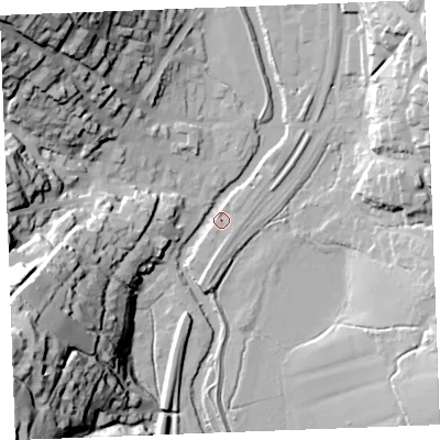 Shaded relief map of the ground around PL220EN, computed from Environment Agency LiDAR. The ground here sits at about 4 m above sea level and falls 57 m across the surrounding 800 m. Surface water reaching this point runs off ground lying to the north-west, 52.7 m higher.