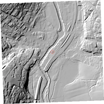 Shaded relief map of the ground around PL220JB, computed from Environment Agency LiDAR. The ground here sits at about 5 m above sea level and falls 54 m across the surrounding 800 m. Surface water reaching this point runs off ground lying to the north-east, 2.1 m higher.