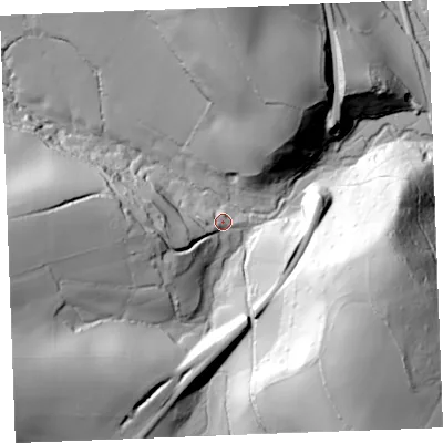 Shaded relief map of the ground around PL220JL, computed from Environment Agency LiDAR. The ground here sits at about 10 m above sea level and falls 73 m across the surrounding 800 m. Surface water reaching this point runs off ground lying to the west, 31.9 m higher.