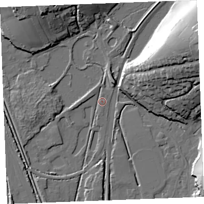 Shaded relief map of the ground around PL242DJ, computed from Environment Agency LiDAR. The ground here sits at about 4 m above sea level and falls 36 m across the surrounding 800 m. Surface water reaching this point runs off ground lying to the west, 5.0 m higher.