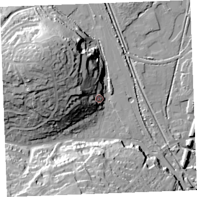 Shaded relief map of the ground around PL242HZ, computed from Environment Agency LiDAR. The ground here sits at about 12 m above sea level and falls 44 m across the surrounding 800 m. Surface water reaching this point runs off ground lying to the west-north-west, 25.6 m higher.