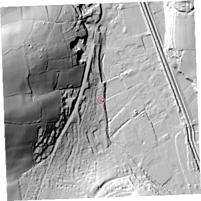 Shaded relief map of the ground around PL242LH, computed from Environment Agency LiDAR. The ground here sits at about 6 m above sea level and falls 77 m across the surrounding 800 m. Surface water reaching this point runs off ground lying to the south-south-west, 35.6 m higher.