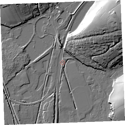 Shaded relief map of the ground around PL242LT, computed from Environment Agency LiDAR. The ground here sits at about 3 m above sea level and falls 37 m across the surrounding 800 m. Surface water reaching this point runs off ground lying to the north-north-east, 6.4 m higher.