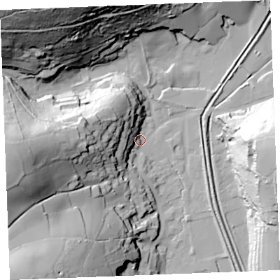 Shaded relief map of the ground around PL242NS, computed from Environment Agency LiDAR. The ground here sits at about 7 m above sea level and falls 78 m across the surrounding 800 m. Surface water reaching this point runs off ground lying to the west, 65.5 m higher.