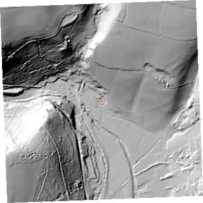 Shaded relief map of the ground around PL242RR, computed from Environment Agency LiDAR. The ground here sits at about 11 m above sea level and falls 120 m across the surrounding 800 m. Surface water reaching this point runs off ground lying to the north-north-east, 92.2 m higher.