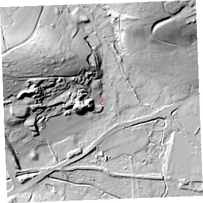 Shaded relief map of the ground around PL253RN, computed from Environment Agency LiDAR. The ground here sits at about 22 m above sea level and falls 50 m across the surrounding 800 m. Surface water reaching this point runs off ground lying to the north-west, 36.6 m higher.
