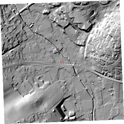 Shaded relief map of the ground around PL255DW, computed from Environment Agency LiDAR. The ground here sits at about 35 m above sea level and falls 49 m across the surrounding 800 m. Surface water reaching this point runs off ground lying to the north, 24.4 m higher.
