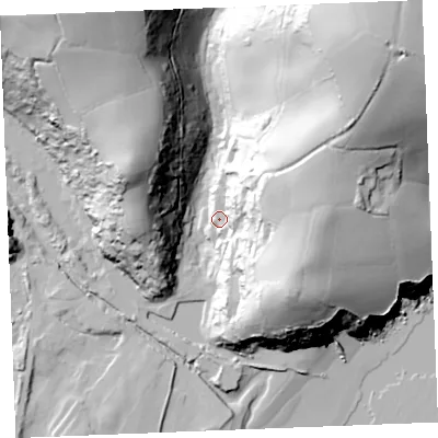Shaded relief map of the ground around PL266DG, computed from Environment Agency LiDAR. The ground here sits at about 12 m above sea level and falls 91 m across the surrounding 800 m. Surface water reaching this point runs off ground lying to the east-north-east, 43.0 m higher.