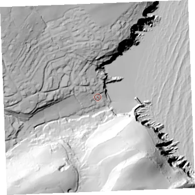Shaded relief map of the ground around PL266JH, computed from Environment Agency LiDAR. The ground here sits at about 12 m above sea level and falls 90 m across the surrounding 800 m. Surface water reaching this point runs off ground lying to the north-west, 70.9 m higher.