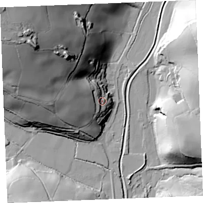 Shaded relief map of the ground around PL267AR, computed from Environment Agency LiDAR. The ground here sits at about 29 m above sea level and falls 86 m across the surrounding 800 m. Surface water reaching this point runs off ground lying to the north-west, 60.6 m higher.