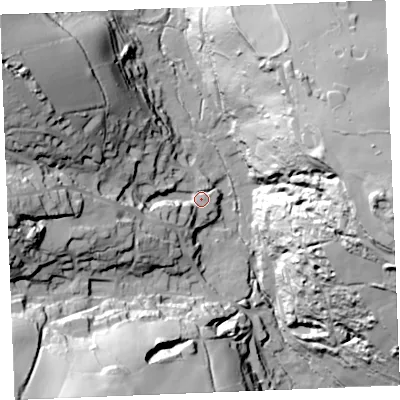 Shaded relief map of the ground around PL267AX, computed from Environment Agency LiDAR. The ground here sits at about 36 m above sea level and falls 78 m across the surrounding 800 m. Surface water reaching this point runs off ground lying to the west-north-west, 51.3 m higher.