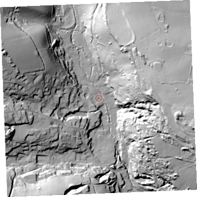 Shaded relief map of the ground around PL267AY, computed from Environment Agency LiDAR. The ground here sits at about 32 m above sea level and falls 79 m across the surrounding 800 m. Surface water reaching this point runs off ground lying to the east-north-east, 65.5 m higher.