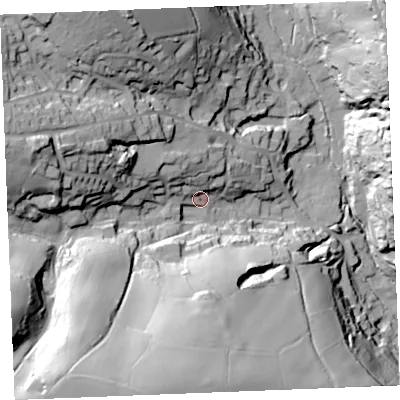 Shaded relief map of the ground around PL267BP, computed from Environment Agency LiDAR. The ground here sits at about 43 m above sea level and falls 73 m across the surrounding 800 m. Surface water reaching this point runs off ground lying to the north-west, 15.7 m higher.