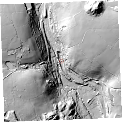 Shaded relief map of the ground around PL268XE, computed from Environment Agency LiDAR. The ground here sits at about 110 m above sea level and falls 112 m across the surrounding 800 m. Surface water reaching this point runs off ground lying to the north-east, 98.6 m higher.